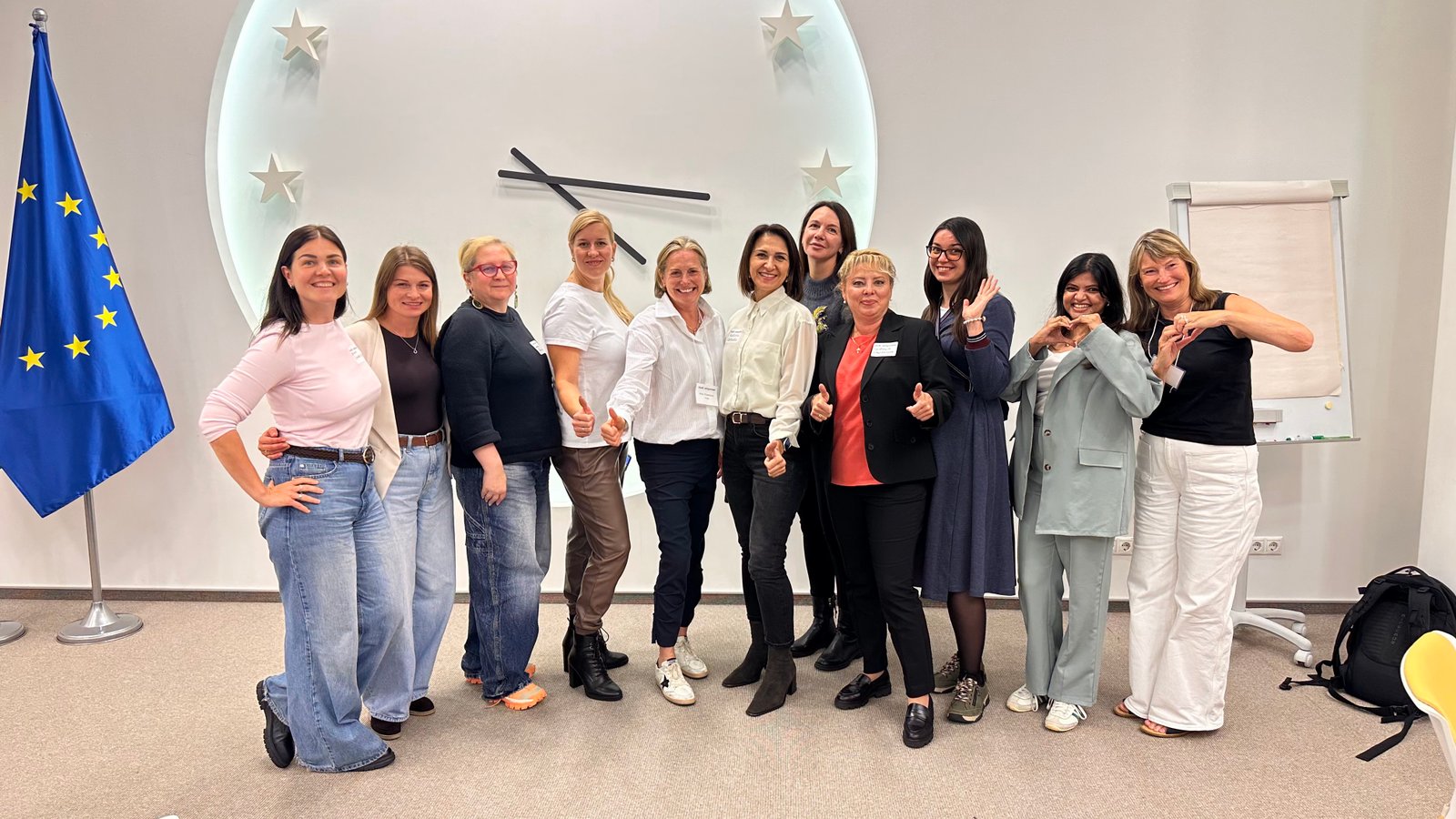 Kelly Thompson with participants of the women's leadership session in Vilnius